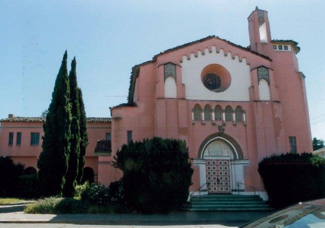 Before: View of the church with overgrown landscaping.